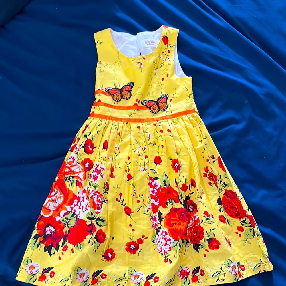 Beautiful yellow dress with butterflies